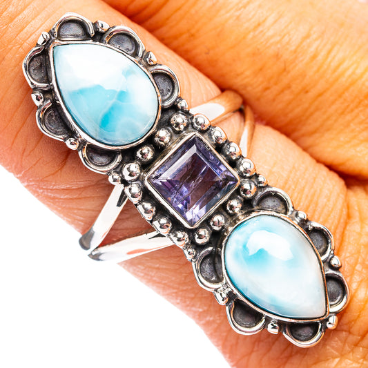 Sterling silver ring with oval light-blue cabochons and purple square gemstone, size 9