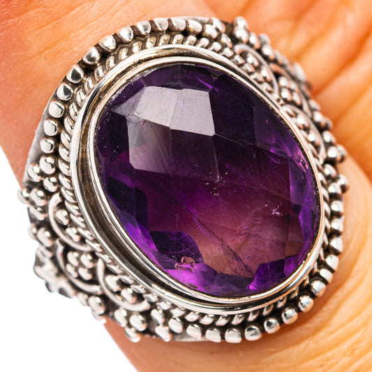 Oval amethyst gemstone ring with beaded sterling silver bezel and textured band