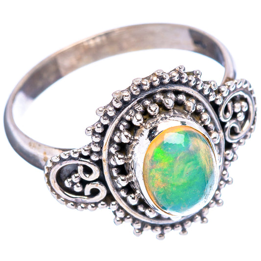 Sterling silver opal ring, oval green-orange Ethiopian opal in ornate bezel