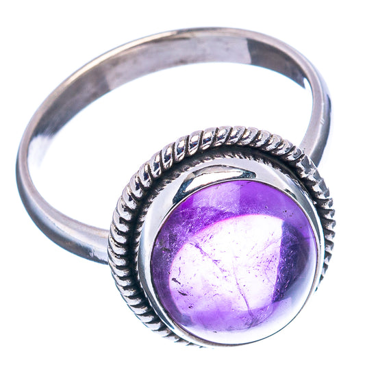 Sterling silver amethyst oval ring, rope bezel around purple gemstone center