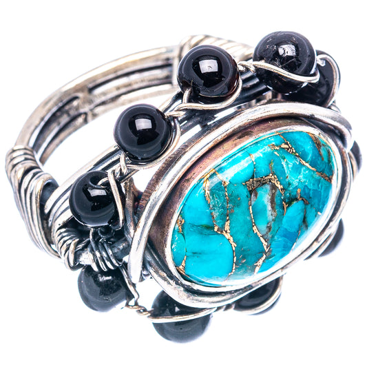 Sterling silver ring with oval turquoise cabochon and black onyx bead accents