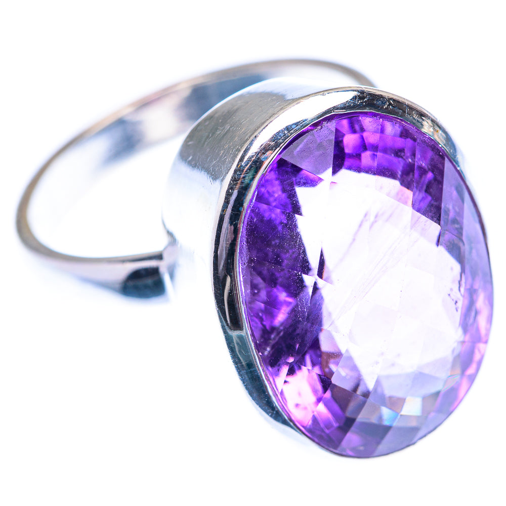 Oval faceted amethyst sterling silver ring with wide polished band and smooth bezel setting