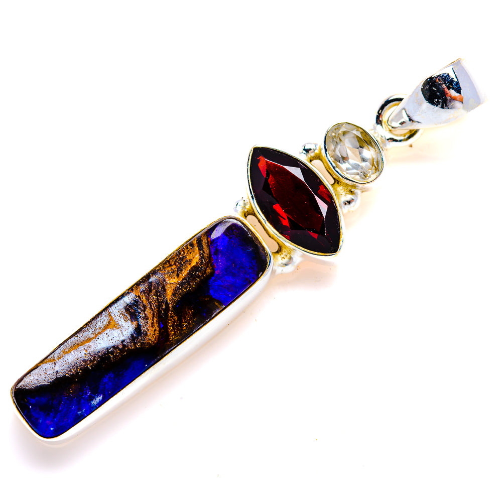 Sterling silver boulder opal pendant with marquise red stone and round clear stone