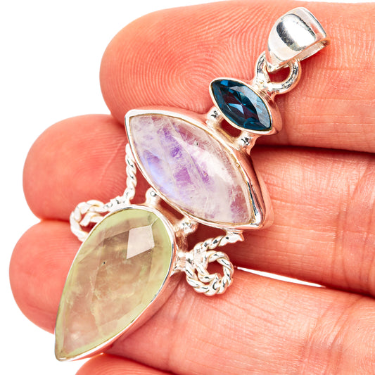 Sterling silver pendant with blue, green, and purple oval and teardrop gemstones