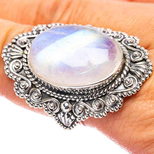 Oval rainbow moonstone ring, .925 sterling silver, ornate filigree frame
