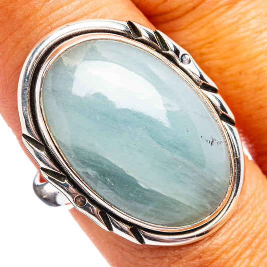 Oval aquamarine cabochon sterling silver ring with bezel and prongs, size 9