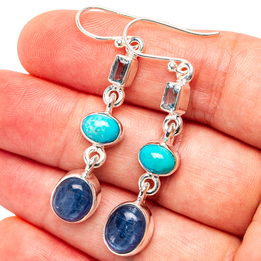 Sterling silver drop earrings with turquoise and blue oval gemstones, linked dangles