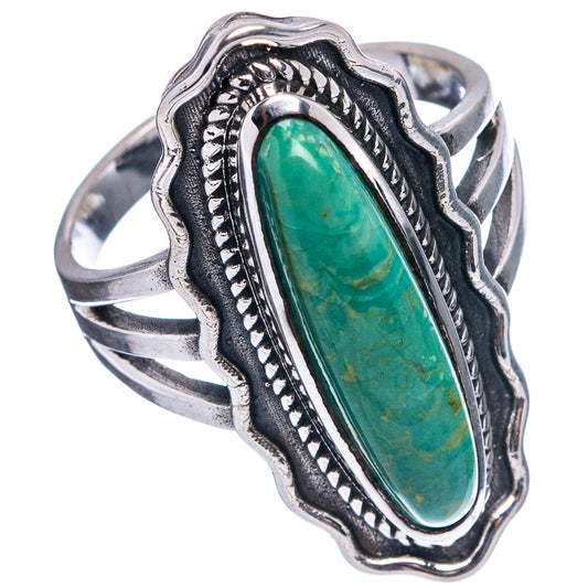 Oval turquoise stone sterling silver ring with engraved border and wavy band
