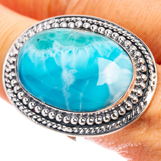Larimar oval ring in .925 sterling silver with ornate beaded border and turquoise stone