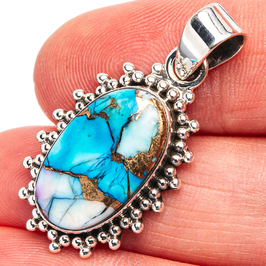 Sterling silver pendant with oval turquoise inlay cabochon and bead-like frame