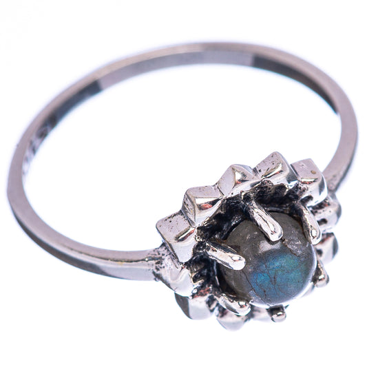 Sterling silver ring with oval labradorite cabochon, claw prongs, and scalloped border
