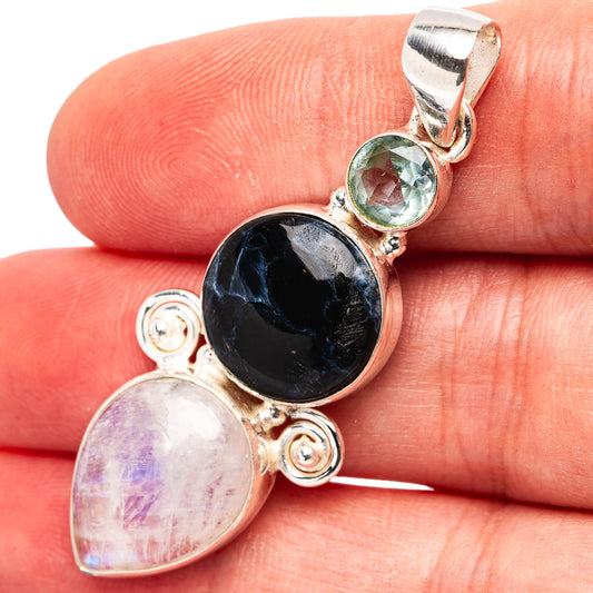 Sterling silver oval pendant on chain with moonstone drop, dark pietersite, blue gem