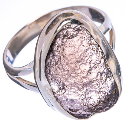 Sterling silver ring with silvery metallic teardrop stone, polished bezel