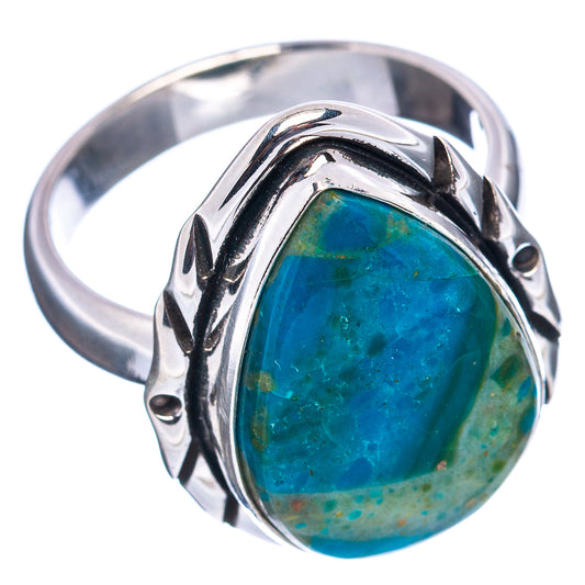 Oval blue opal cabochon ring in .925 sterling silver with decorative side details