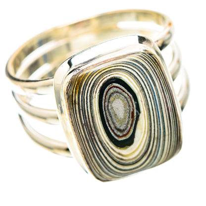 Sterling silver ring with oval fordite stone, concentric striped pattern, openwork band