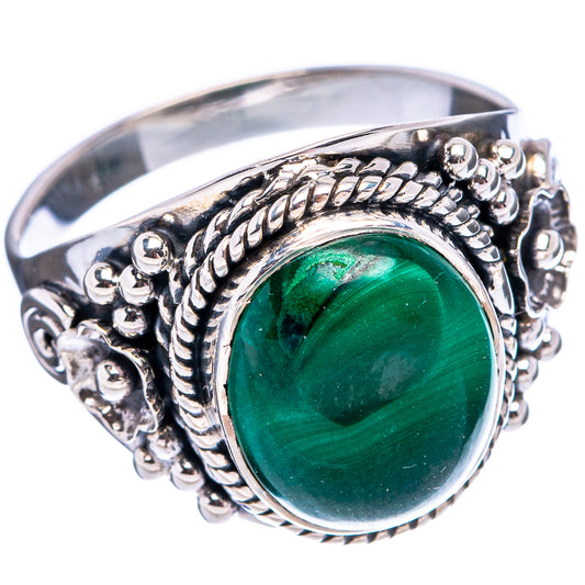 Sterling silver malachite ring with green oval cabochon and rope-textured setting