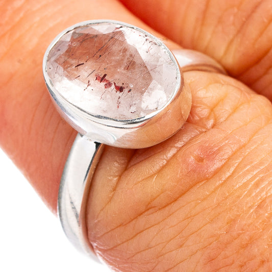 Sterling silver ring, size 6.75, oval bezel set stone with red flecks