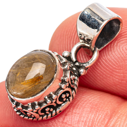 Rutilated quartz pendant with oval golden stone and ornate 925 sterling silver bail