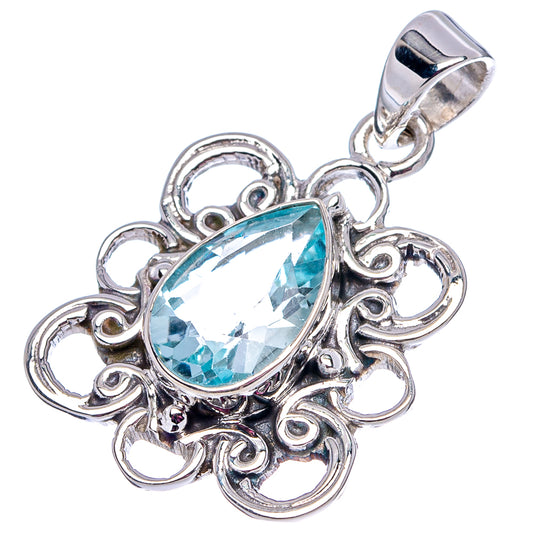Sterling silver blue topaz pendant with oval gemstone and ornate floral setting