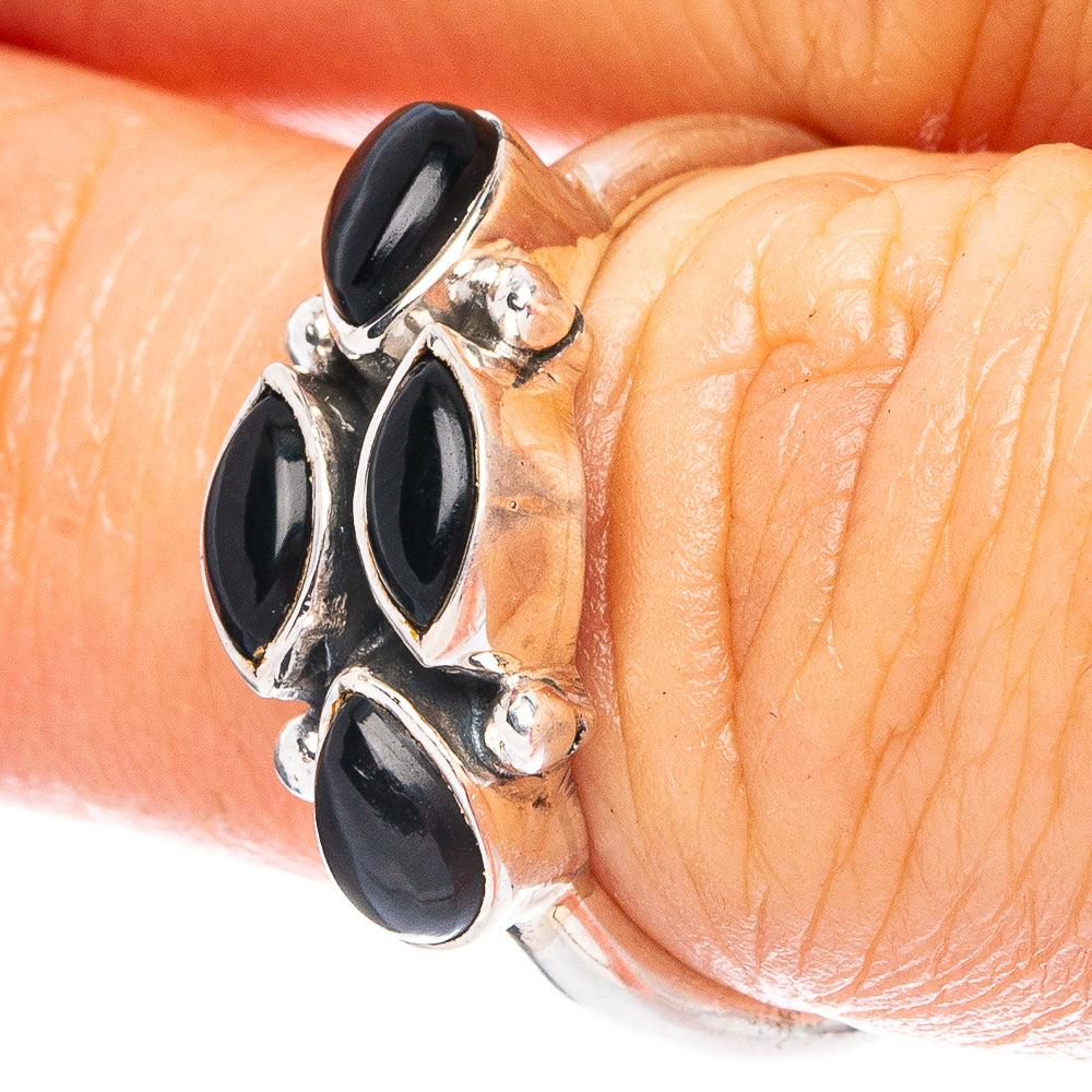 925 sterling silver ring with three oval black onyx stones on a linked band