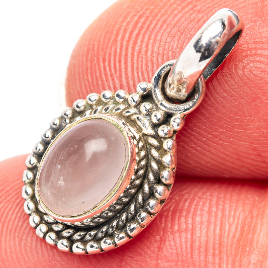 Rose quartz pendant in .925 sterling silver, oval pink stone with beaded wire frame