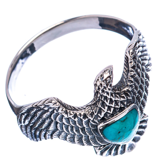 Turquoise eagle motif sterling silver ring with oval turquoise stone, detailed wings