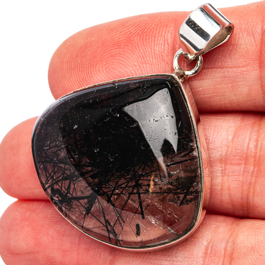 Sterling silver teardrop pendant with glossy black tourmalinated quartz stone