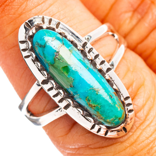 Turquoise oval stone sterling silver ring with ornate bezel details