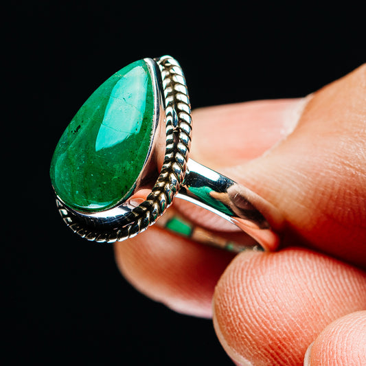 Side view of green teardrop gemstone ring, .925 sterling silver rope border band