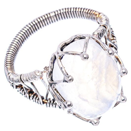 Sterling silver beaded band ring with oval rainbow moonstone and raised side prongs