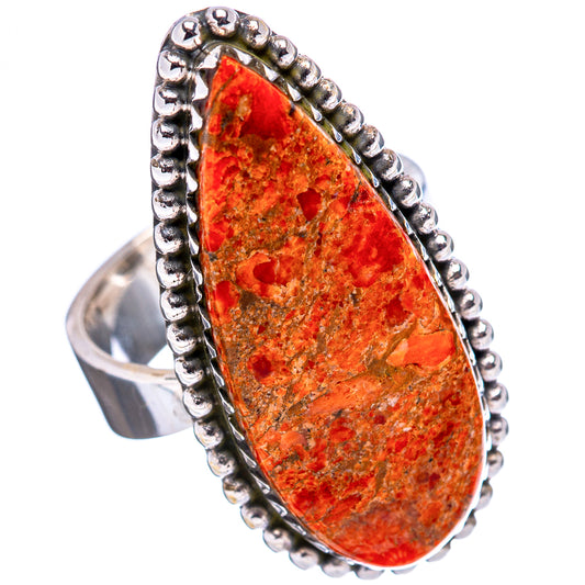 Sterling silver ring with red-orange sponge coral teardrop cabochon and beaded border