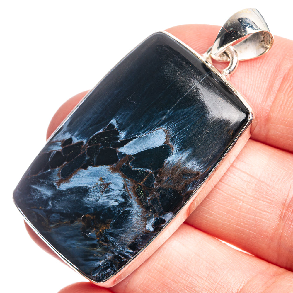 Rectangular sterling silver pietersite pendant with dark blue, silvery streaks and bail