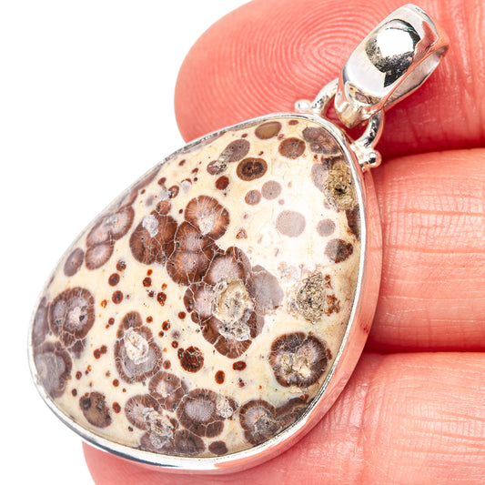 Oval asteroid jasper pendant in .925 sterling silver bezel with round top bail