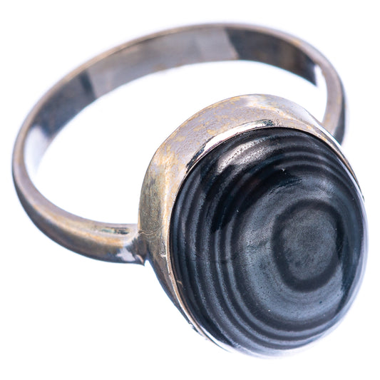Sterling silver ring featuring oval dark psilomelane cabochon on open band