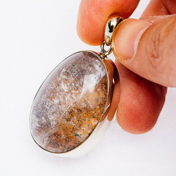 Garden quartz pendant with oval speckled stone and silver-tone bail