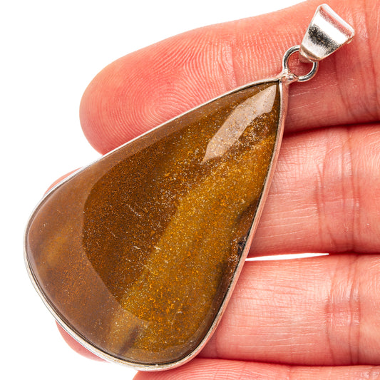 Silver-plated teardrop agate pendant with brown-gold druzy center and bail loop