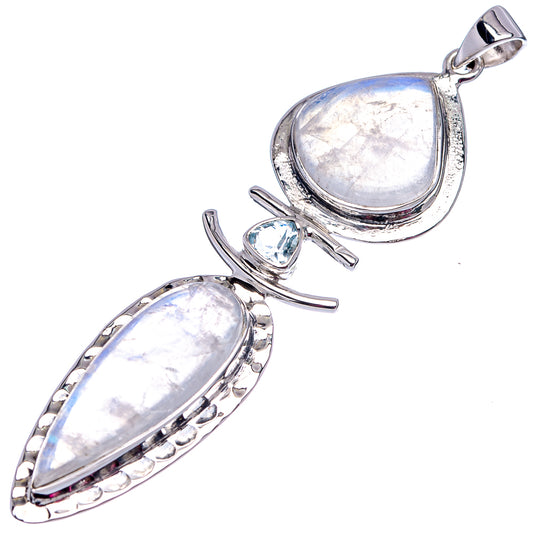 Sterling silver oval moonstone pendant with blue topaz accent and loop bail