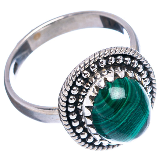 Sterling silver ring with oval green malachite cabochon, textured beaded band