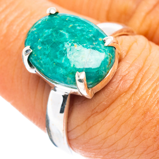 Oval turquoise cabochon sterling silver ring with split bezel and small prongs