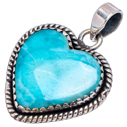 Oval heart larimar gemstone pendant with bright blue stone and braided silver bezel.