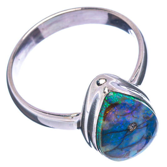 Sterling silver opal ring with blue-green oval gemstone on split band