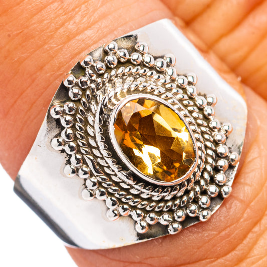 Citrine oval ring in .925 sterling silver, ornate bead and rope halo setting