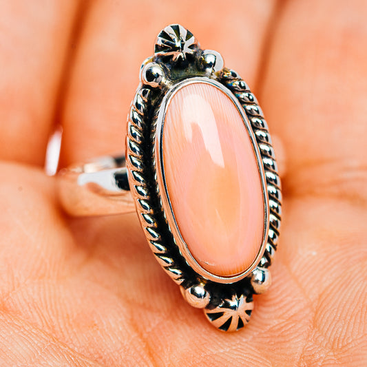 Pink oval conch shell ring, sterling silver with rope edge and starburst top