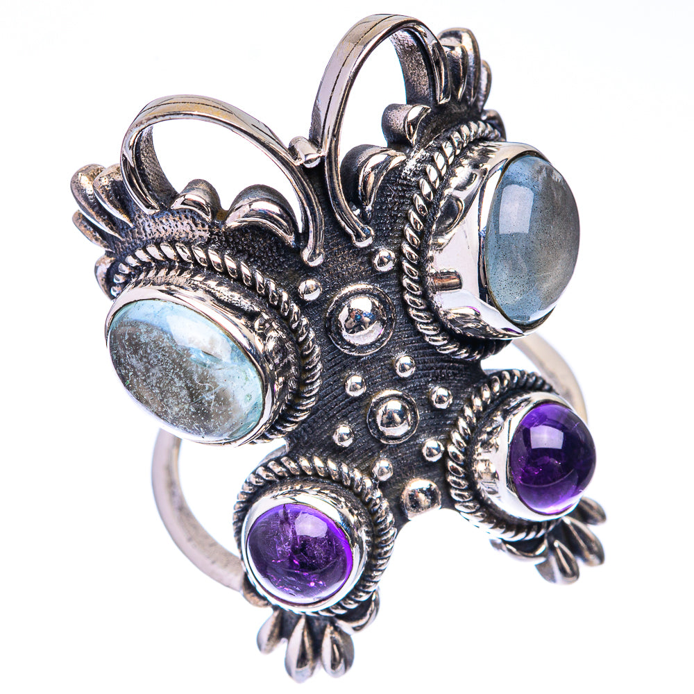 Ornate 925 sterling silver ring with two aquamarine cabochons and three amethyst round stones