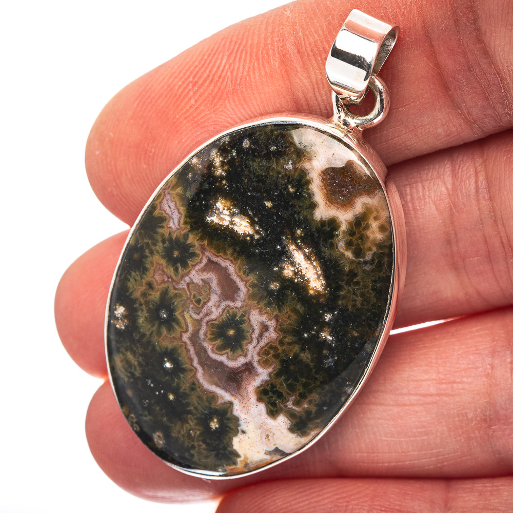Oval ocean jasper pendant with 925 sterling silver bezel and bail, natural mottled pattern