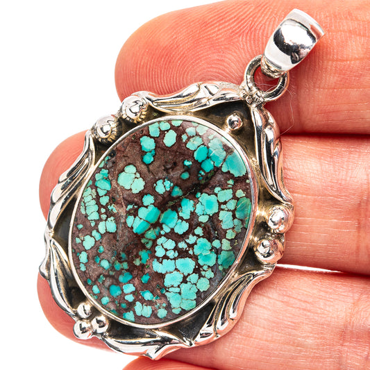 Turquoise mosaic pendant with oval .925 sterling silver bezel and ornate frame