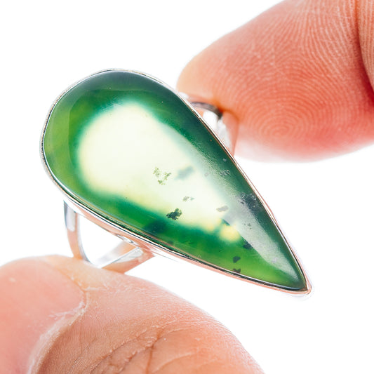 Teardrop nephrite jade ring with .925 sterling silver band, green cabochon