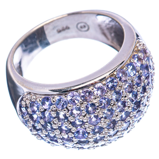 Sterling silver ring with faceted blue stones, wide pave band