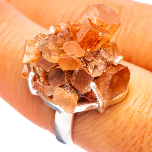 Raw orange aragonite cluster ring with .925 sterling silver band, prong-set stones