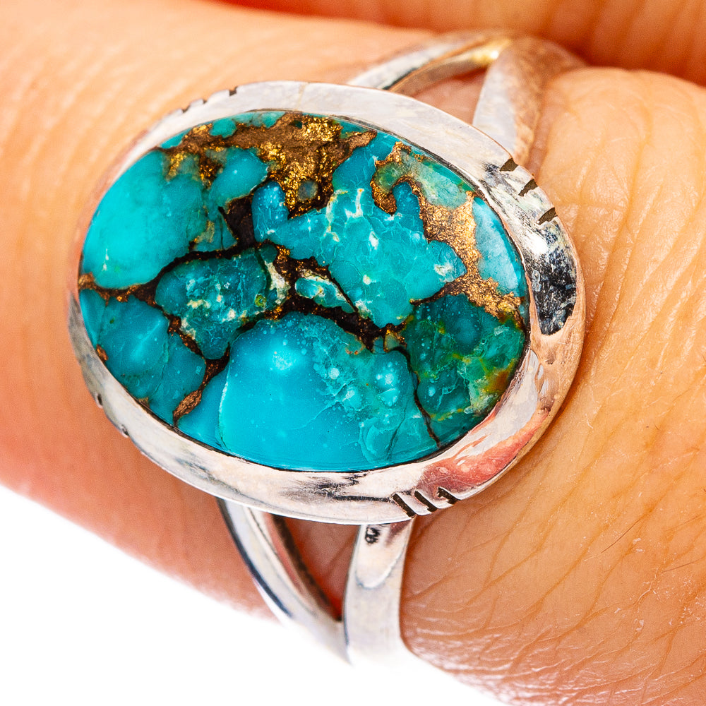 Turquoise gemstone ring with gold matrix in 925 sterling silver, close-up top view